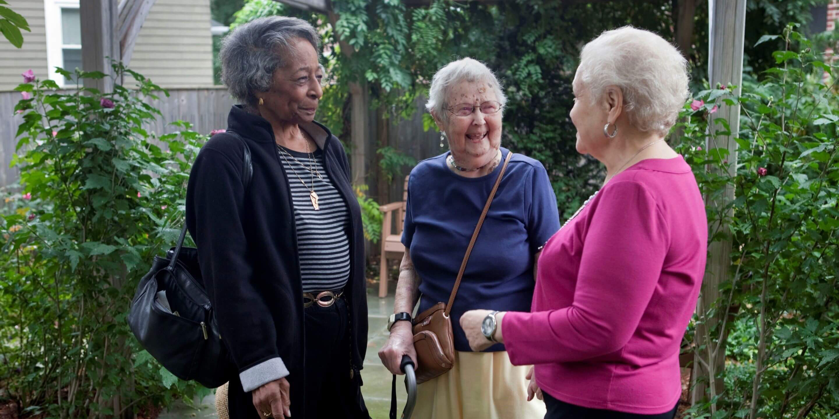 3 Older women standing together