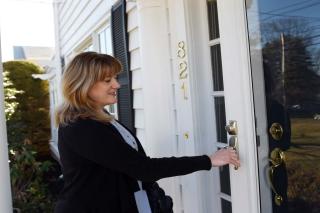 Woman caretaker visiting home