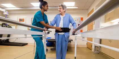 Woman Nurse with Woman Patient