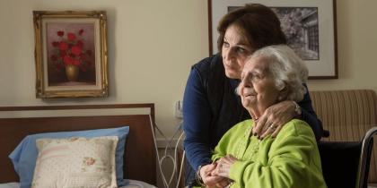 Adult woman child hugging her mom