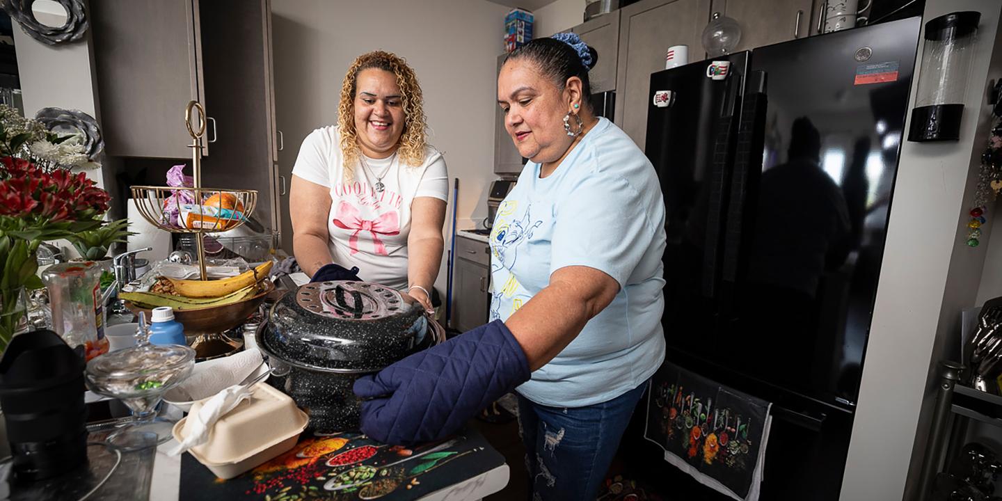 Leyland resident cooking with daughter