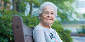 Senior woman sitting outside