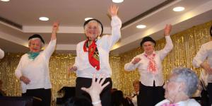 Older women dancing together