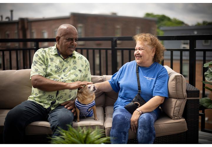 Leyland Resident sitting with dog