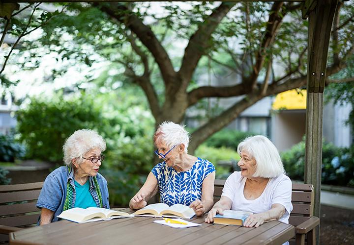 Older Women sitting in courtyard